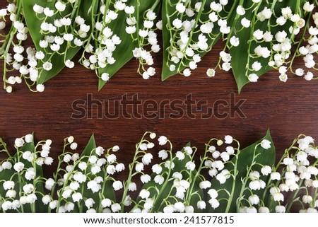 Frame with  white lilies. Lily of the valley.