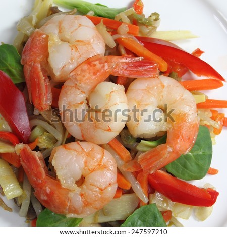 Fried shrimp on a salad of steamed vegetables