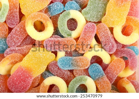 Sweet background with colorful jelly candies. Unhealthy food.