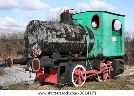 Vintage steam engine locomotive. Railway. Old machinery.
