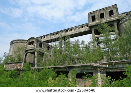Vintage abandoned cement plant in Poland. Industrial architecture.