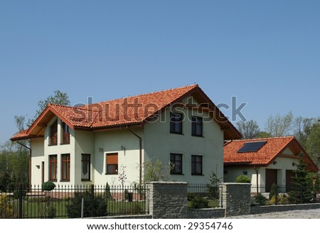 New single family home with red slate roof