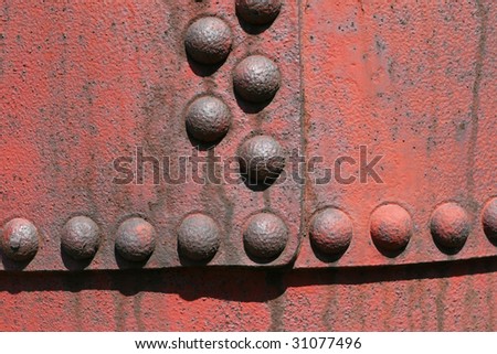 Industrial texture - steel tin surface with rivets. Metallic background.