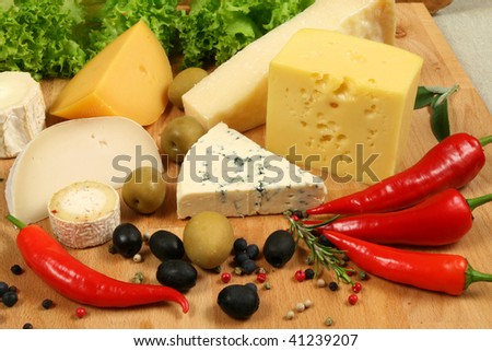 Variety of cheese: ementaler, gouda, Danish blue soft cheese and other hard cheeses. Herbs and spices.