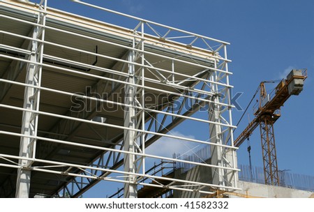 Construction site - steel and concrete structure. Industrial development.