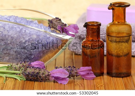 Relaxing spa resort composition - bath soap, towels, lavender flower, bottles with lotions