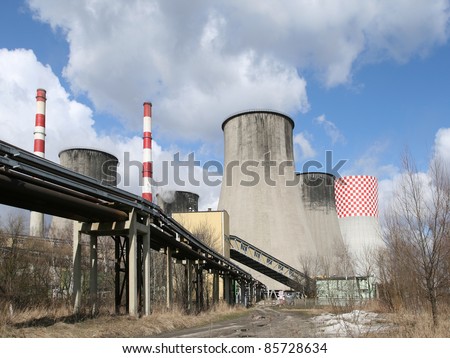 Power generation in Poland - cooling towers of a coal electric power plant. Fossil fuel electricity.