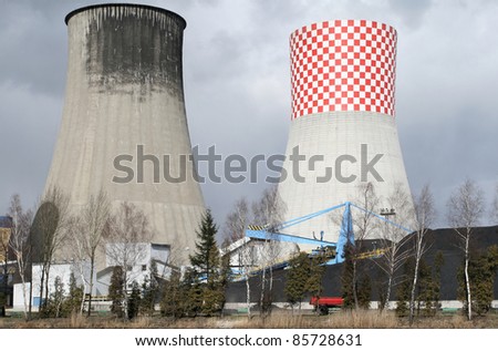 Power generation in Poland - cooling towers of a coal electric power plant. Fossil fuel electricity.