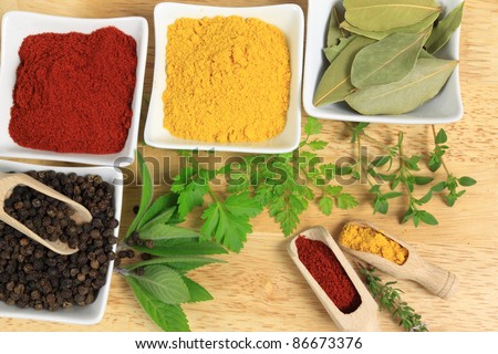 Cooking ingredients - herbs and spices. Food additives: pepper, turmeric, mint, thyme and bay laurel leaves.