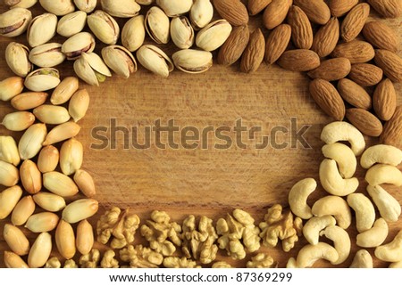 Varieties of nuts: peanuts, walnuts, cashews, pistachio and almonds. Food and cuisine.