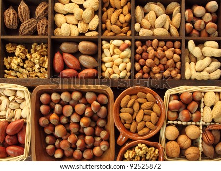 Varieties of nuts: peanuts, hazelnuts, chestnuts, walnuts,  pistachio and others.