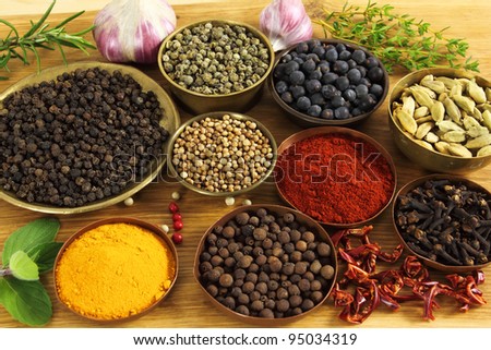 Spices and herbs in metal  bowls. Food and cuisine ingredients. Colorful natural additives.