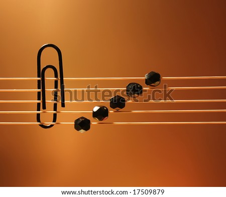 stylized design of musical notation with gold gradient background
