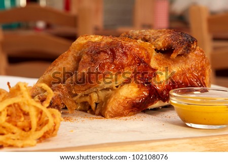roasted chicken on plate with salad