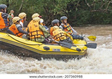 LOEI,THAILAND JULY 27  : Unidentified asian people in action at rafting adventure 2014 on San river on July,27,2014 in Loei Province,Thailand.