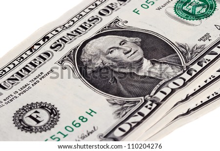 Part of three dollar notes isolated on white background