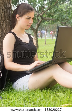 High school teenager student work hard, girl doing homework on laptop