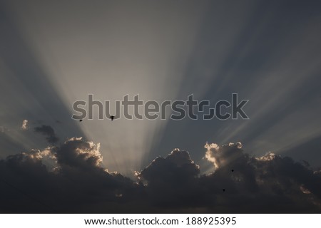 Light rays after storm/Light rays passing through a cloud after a storm in Bucharest. Romania, Bucharest, August 8, 2012