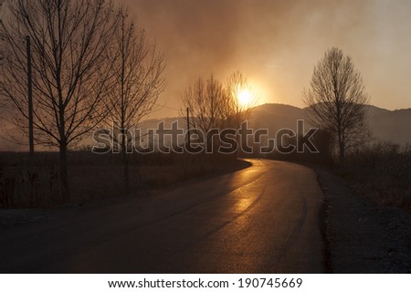 Sun sets on my street/Sunset on the hills of Satu Mare county. Romania, Negresti Oas, November 11, 2011