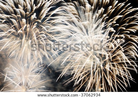 Pale golden colored fireworks explosion