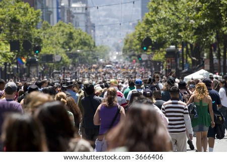Crowd of people walking on the street shallow depth of field