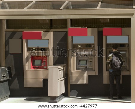 Person accessing Automatic Teller Machine