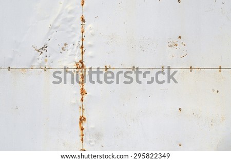 riveted old weathered rusty white metal background