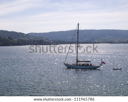 sailboat at sea in horizontal composition