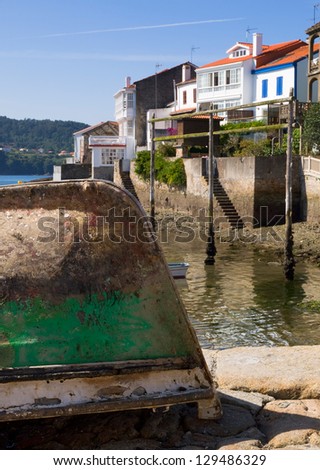 Wooden boat and fishing village. This village is called Redes and is located in Galicia, Spain.