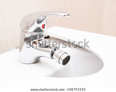Chrome mixer tap in a bathroom