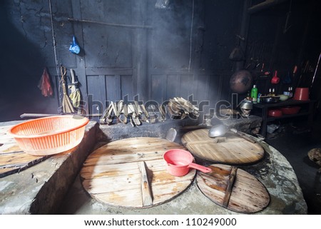 old chinese kitchen in an old village, this is a kitchen in a wooden building which has 150 years history, photo taken in Fuzhou Jiangxi province