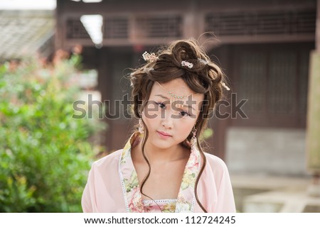Chinese female model with traditional chinese clothes in the Tang dynasty