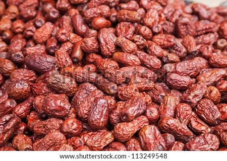 dried red date stacked in the market place