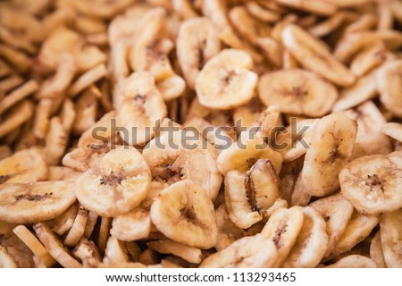 Banana chips,   dehydrated slices of fresh ripe bananas fried with oil give this product