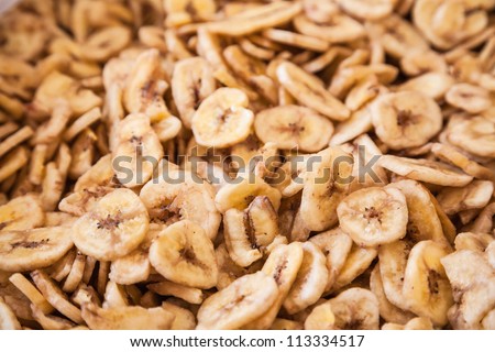 Banana chips, made from dehydrated slices of fresh ripe bananas