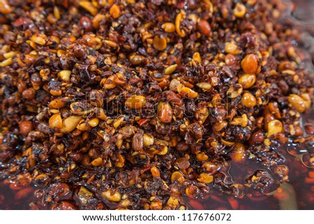 fermented soy bean with pea nuts , sunflower seeds, and chili sauce , a popular condiment in China