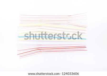 colorful bendable plastic straw on white background studio shoot