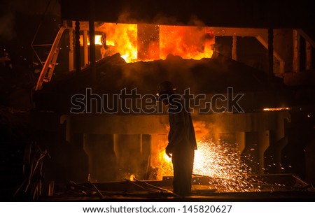 melting waste iron use electric old method in a steel making factory