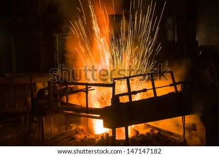 melting waste iron use electric old method in a steel making factory