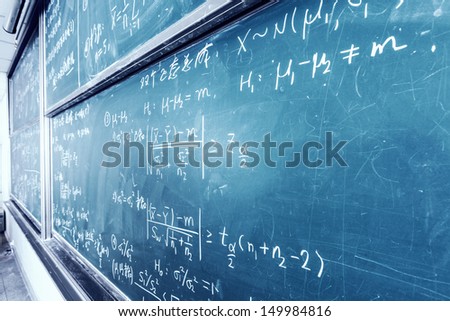 blackboard with complicated stastical math formulas blackboard with complicated stastical math formulas
