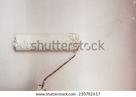 roller paint the wall with coating materials