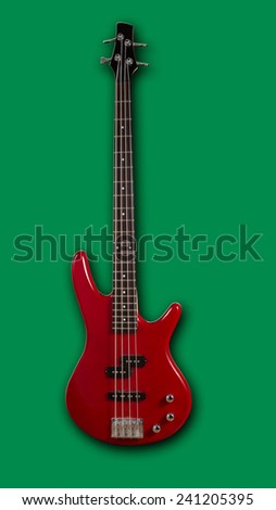 View on classic bass brown electric guitar with four strings isolated on green background. Clipping path included