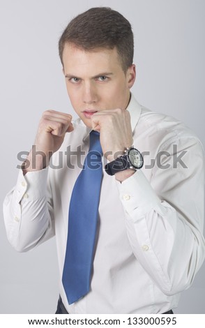 Business man ready to fight for job - isolated over white background