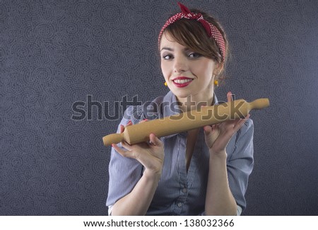 Sexy pin up girl with rolling pin