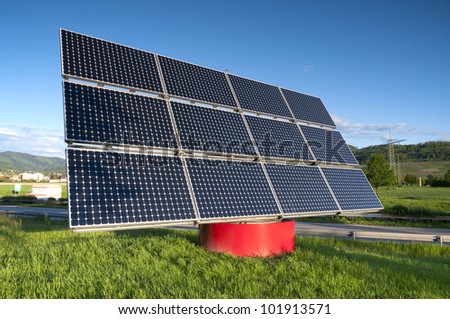 Solar Panel Station near the Highway Against The Blue Sky