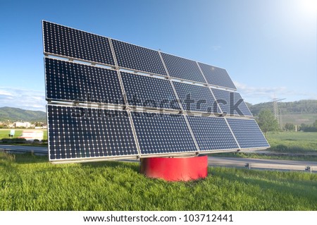 Solar Panel Station near the Highway Against The Blue Sky