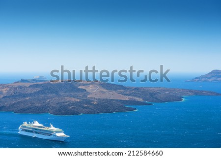 Cruise Ship Near Volcano On Island of Santorini