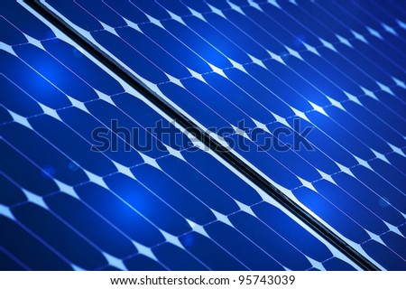 Blue Photovoltaic solar panel With Lights On It