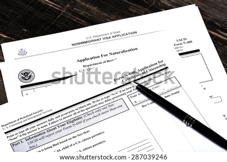 USA Immigration Applications Closeup. Public documents and studio props.