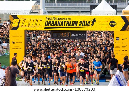 SINGAPORE - MARCH 1: Runners at Urbanathlon 2014 running with Men\'s Health Singapore launch March 1, 2014 in Singapore